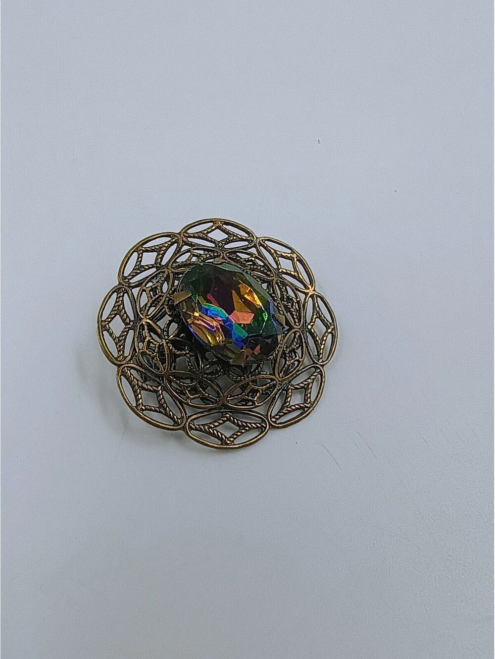Vintage Brass Filigree Brooch with Multicolor Faceted Glass Stone